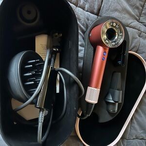Dyson strawberry colored Hair Dryer with Attachments